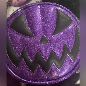 Love Pain and Stitches purple mini jack-o’-lantern bag